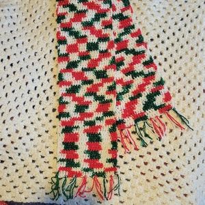 Handmade crochet scarf. It is in variegated yarn.